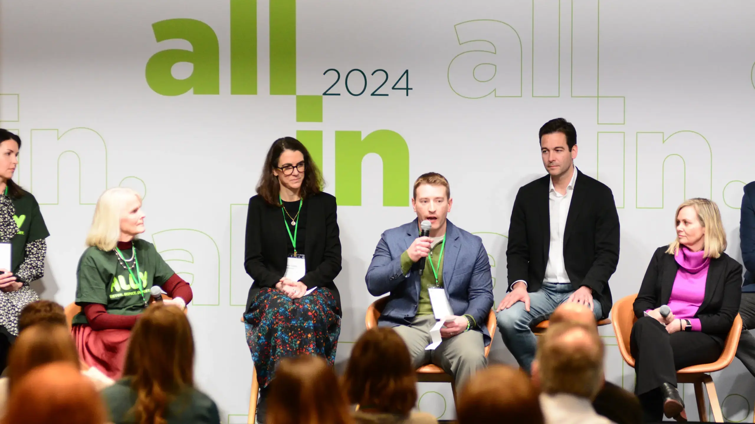 A panel of speakers at All In 2024