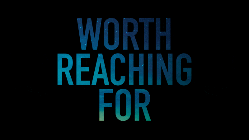 Scrolling animation of the words "Worth Reaching For" on a black background with the night sky within the letters.