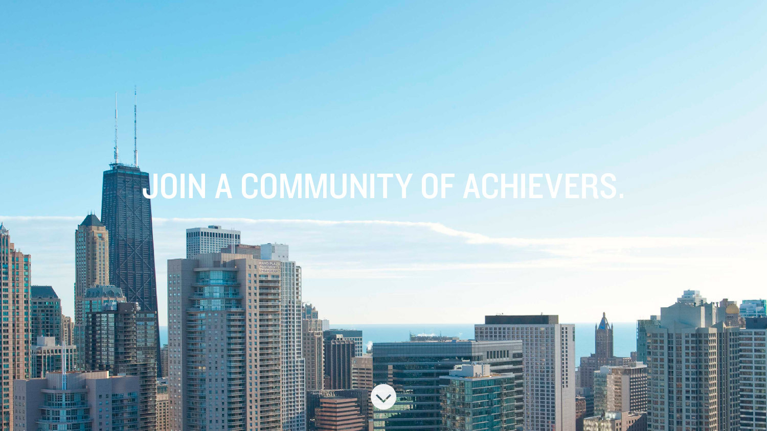 Skyline of a city under a clear blue sky with the text "Join a Community of Achievers."