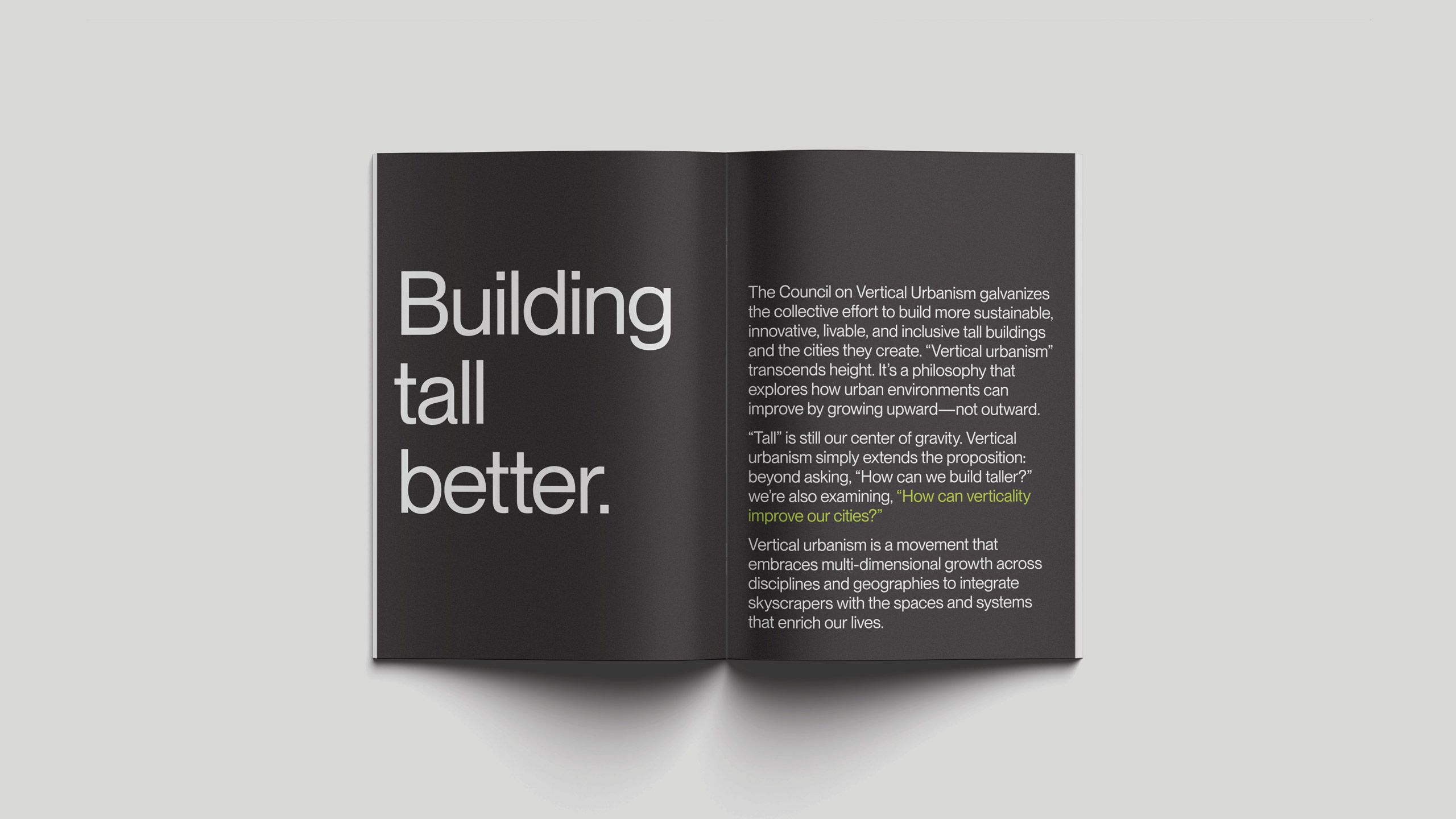 Open booklet on a gray background. Left page reads "Building tall better." in bold white text. Right page has smaller text discussing vertical urbanism.