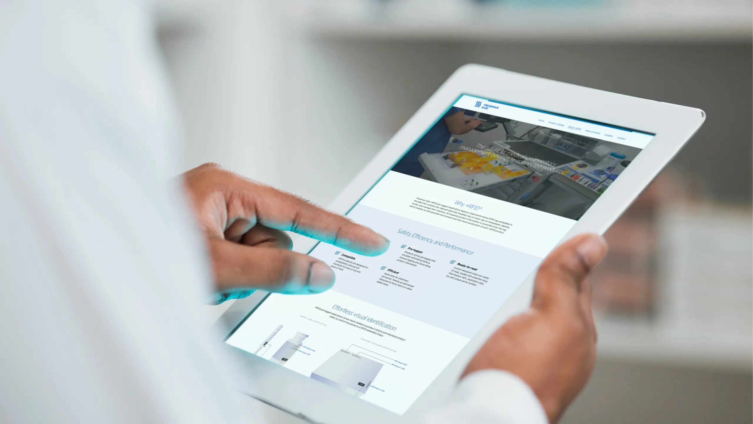 A person in a white coat uses a tablet, displaying the Fresenius Kabi +RFID website with medical imagery and text.