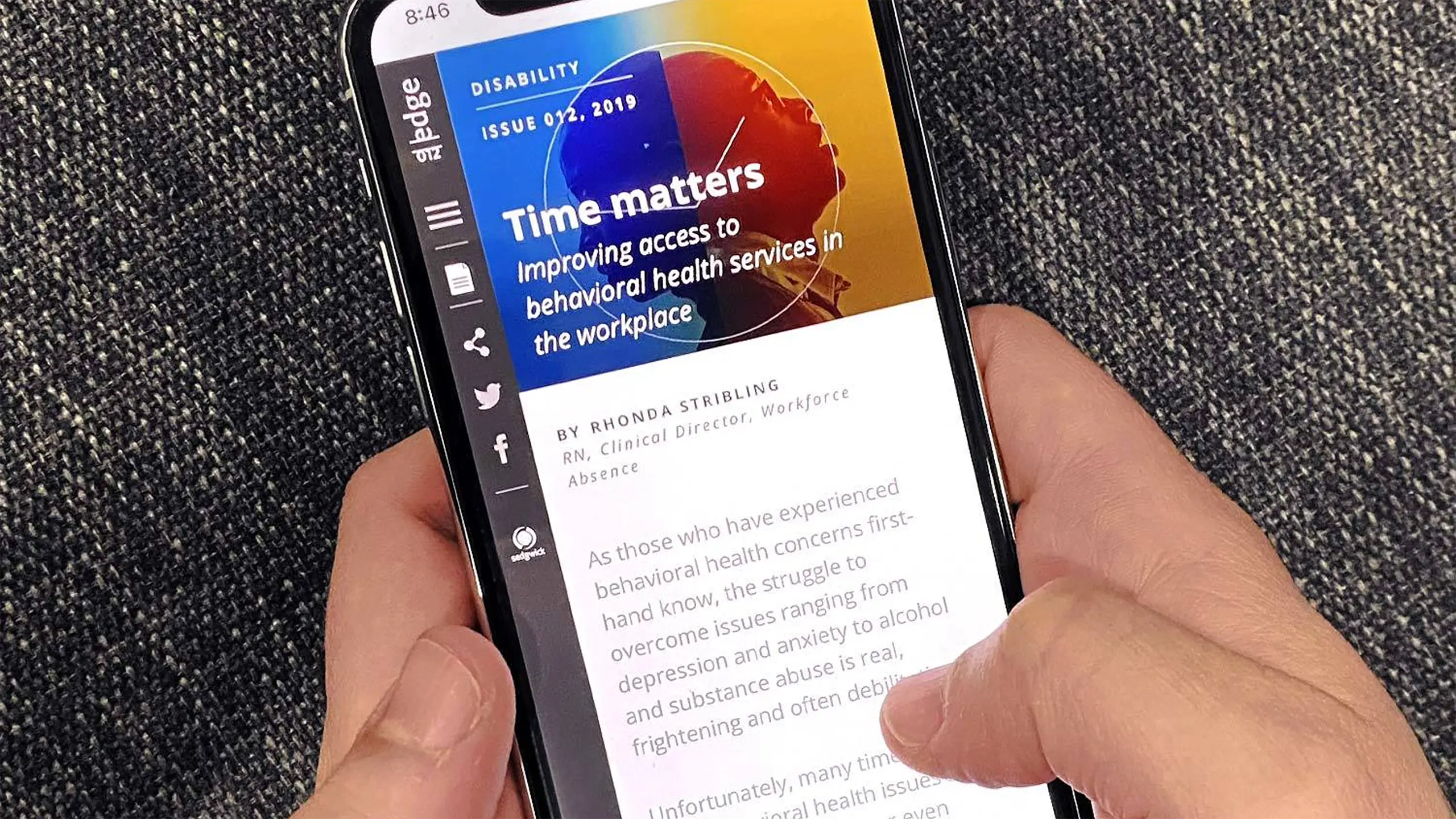 A person holds a smartphone displaying an article titled "Time matters: Improving access to behavioral health services in the workplace." The background is a blue and orange gradient, and the image suggests a focus on mental health awareness.